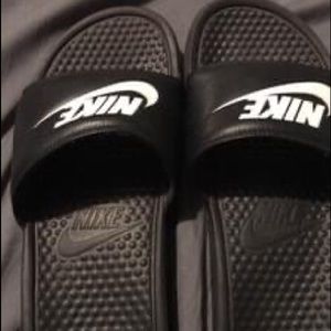 nike slides black and white writing